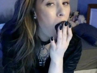 Emo Girl puts dildo give her mouth and takes every inch of it