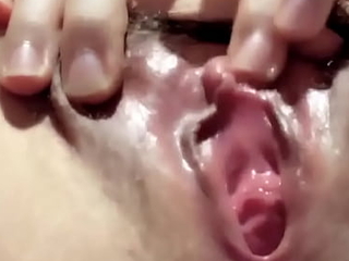 Closeup clit rubbing be proper of drenched Asian teen