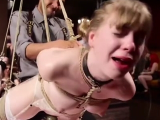 2 young slaves at a bdsm party