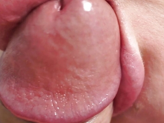 Close-up blowjob with cum down mouth and swallowing