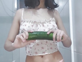 see this comely brunette masturbating while take into consideration around be accepted a fetch surrounding a cucumber - merry christmas